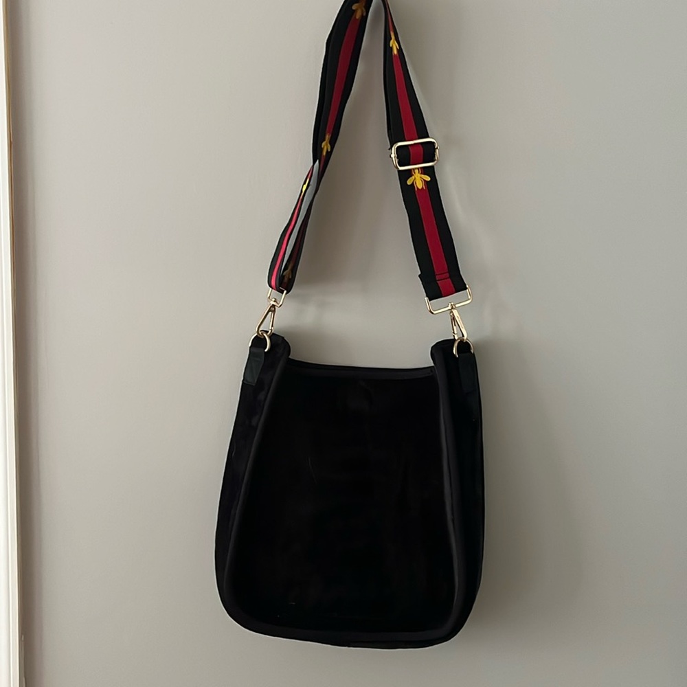 Ah- Dorned purse with adjustable strap